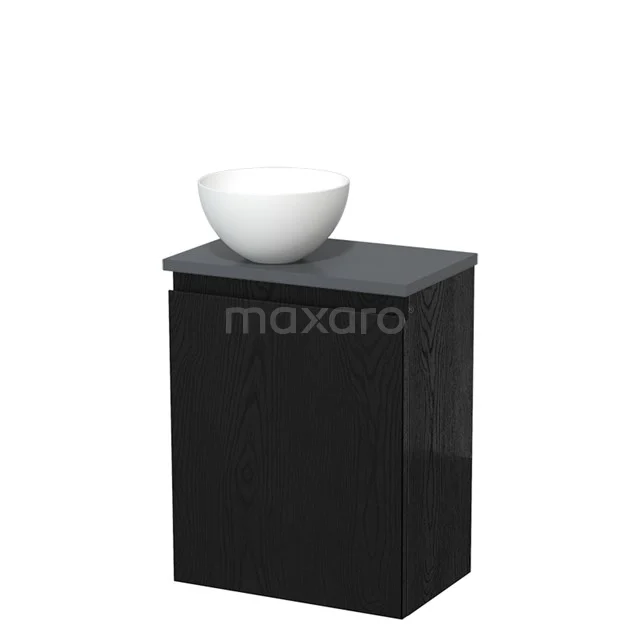 Zwart badkamermeubel met mat afwerking, opbouw waskom van keramiek en strakke vormgeving, ideaal voor moderne badkamers.