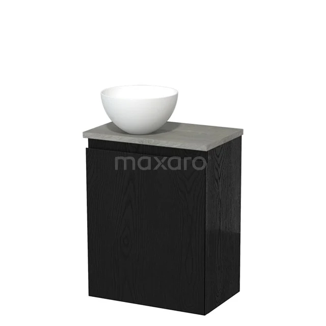 Zwart badkamermeubel met keramische ronde wastafel en betonlook blad, ideaal voor een moderne badkamer.