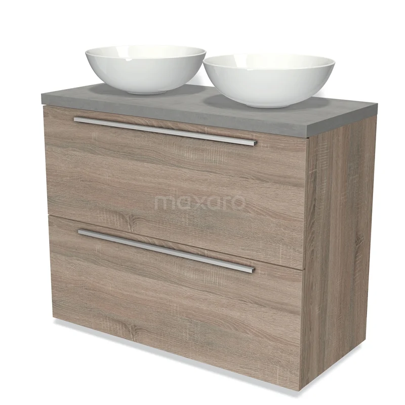 Badmöbel für Aufsatzwaschbecken 100cm Modulo Plato Eiche 2 hohe Schubladen Flach hellgrauer Beton Platte BMK13-00713 Badezimmermöbel Holzoptik mit zwei weißen Aufsatzwaschbecken, grauer Platte und metallischen Griffen; modernes Design für ein stilvolles Badezimmer.