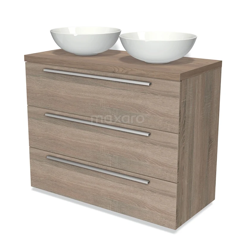 Badmöbel für Aufsatzwaschbecken 100cm Modulo Plato Eiche 3 Schubladen Flach Mittelbraune Eiche Platte BMK19-00710 Holz Badezimmermöbel mit heller Eiche Oberflächenbehandlung, drei Schubladen und zwei weißen keramischen Aufsatzwaschbecken.