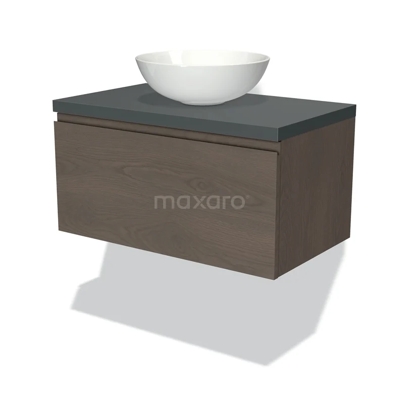 Wandmeubel met donkere houten afwerking, grijs blad en witte waskom; stijlvol badkamerdesign met moderne uitstraling.