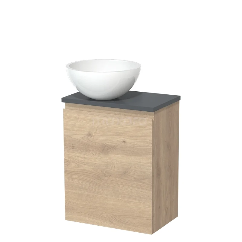 Houten badkamermeubel met zwarte bovenblad en witte ronde waskom, compact design ideaal voor moderne badkamerinterieurs.