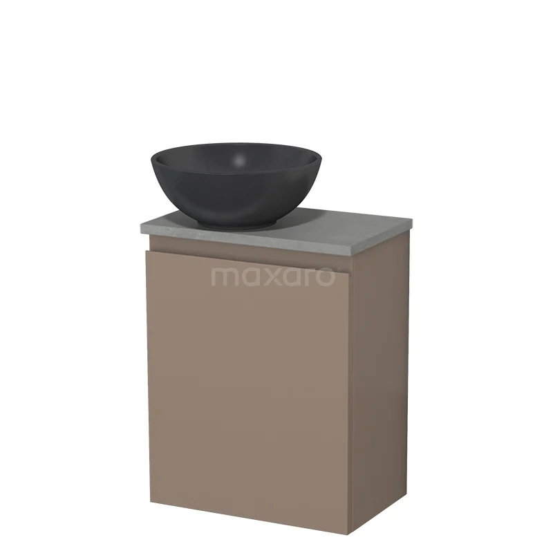 Compacte badkamermeubelset met beige kast, grijze top en mat zwarte keramische opzetwaskom.