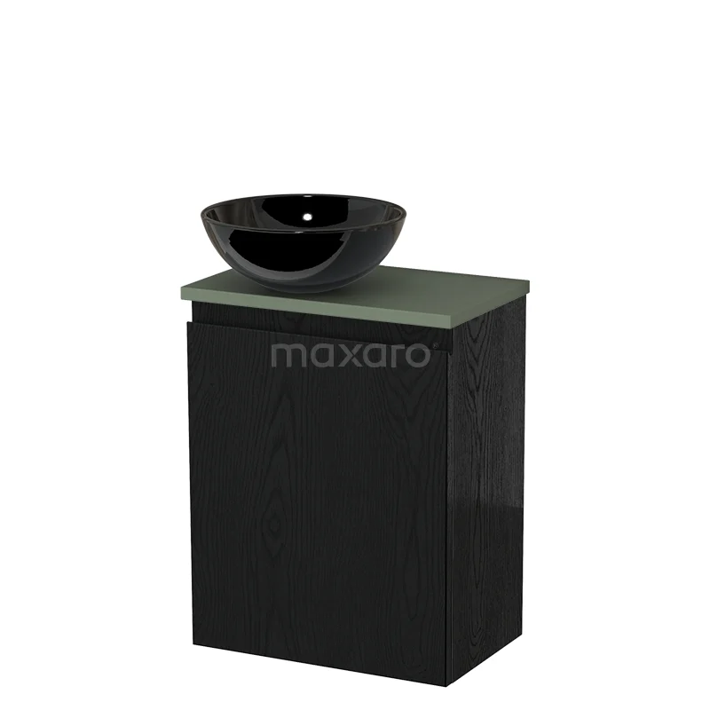 Zwarte badkamerkast met groene bovenblad en zwarte waskom, compact design, ideaal voor moderne badkamerinrichting.